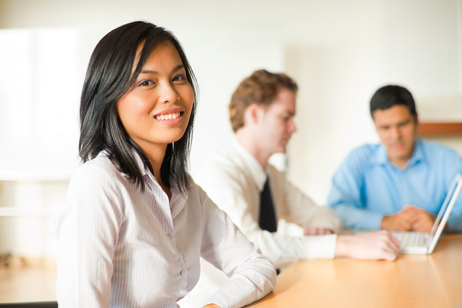 asian businesswoman at conference table